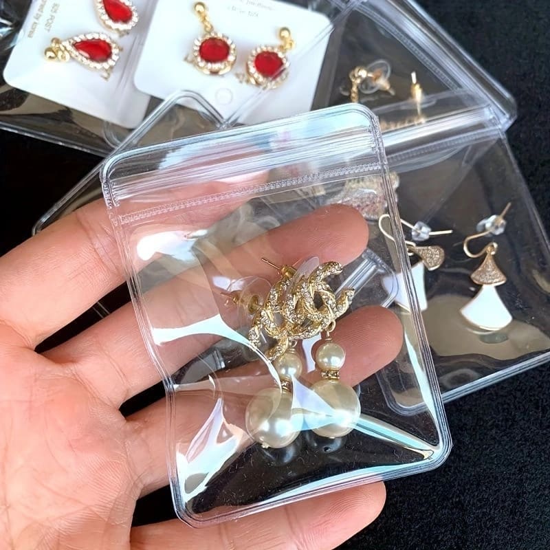 Kit 20 a 40 Pcs de Saco para armazenamento de Jóias - Transparente para colares e pulseiras